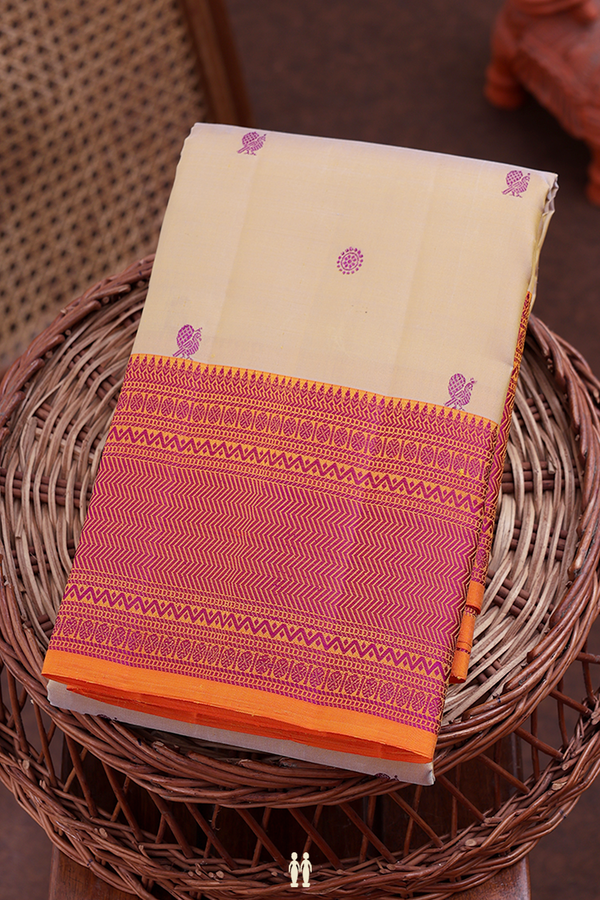 Kanchipuram Silk Saree In Light Brown With Peacock Buttas