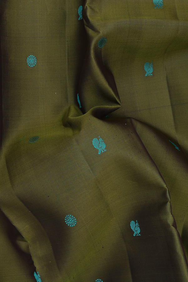 Kanchipuram Silk Saree In Olive Green With Peacock Buttas