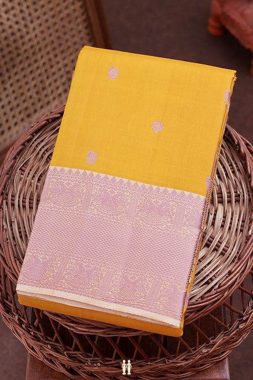 Kanchipuram Silk Saree In Saffron Yellow With Peacock Design