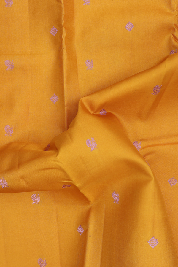 Kanchipuram Silk Saree In Saffron Yellow With Peacock Design