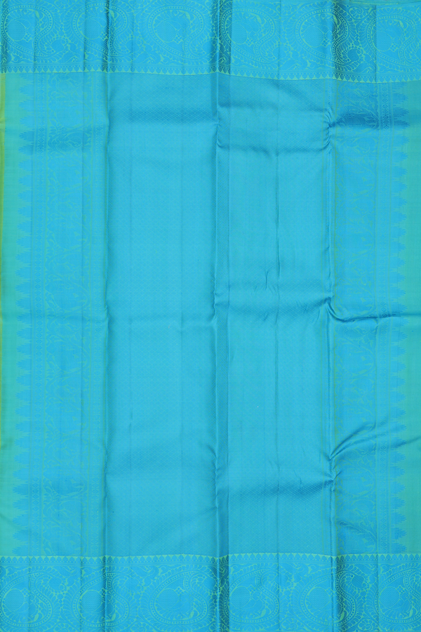 Kanchipuram Silk Saree In Parrot Green With Peacock Buttas