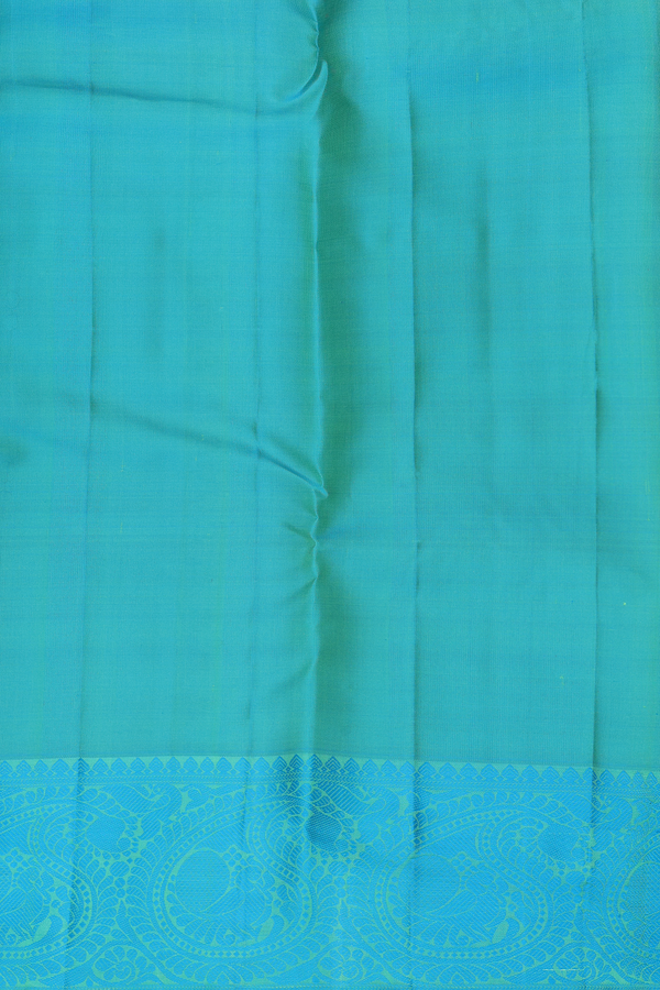 Kanchipuram Silk Saree In Parrot Green With Peacock Buttas