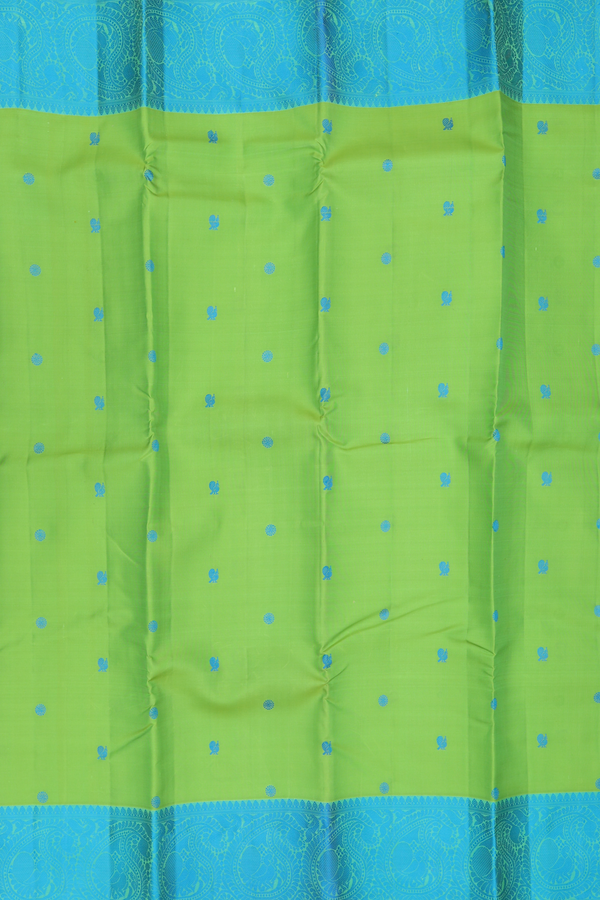 Kanchipuram Silk Saree In Parrot Green With Peacock Buttas