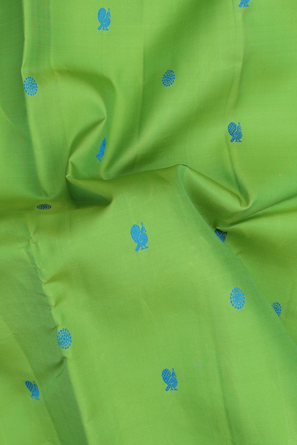 Kanchipuram Silk Saree In Parrot Green With Peacock Buttas