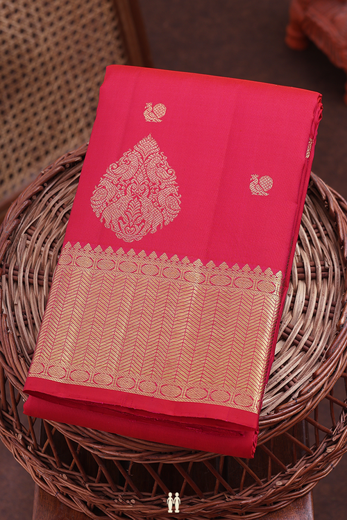 Kanchipuram Silk Saree In Reddish Pink With Peacock Buttas