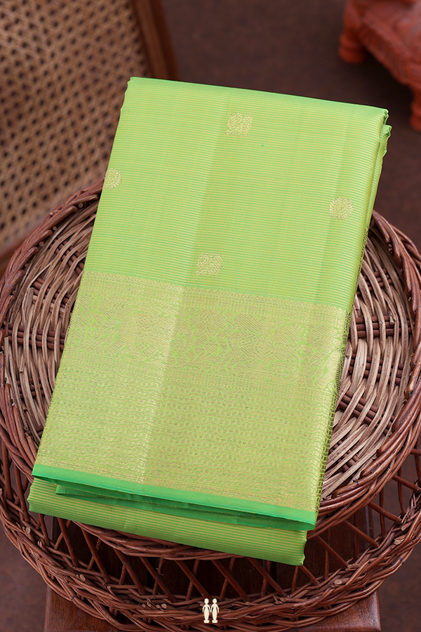 Kanchipuram Silk Saree In Green Along Stripes With Buttas