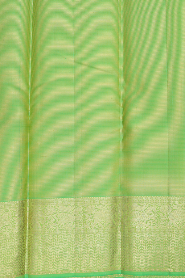 Kanchipuram Silk Saree In Green Along Stripes With Buttas