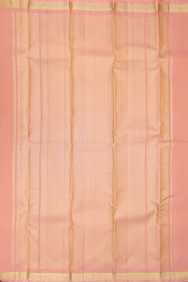 Kanchipuram Silk Saree In Light Orange With Peacock Buttas