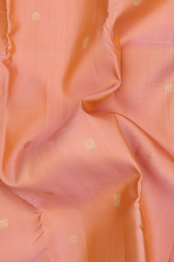 Kanchipuram Silk Saree In Light Orange With Peacock Buttas