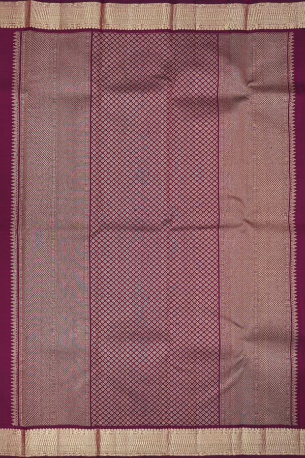 Kanchipuram Silk Saree In Plum Purple With Chakram Buttas