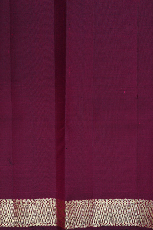 Kanchipuram Silk Saree In Plum Purple With Chakram Buttas