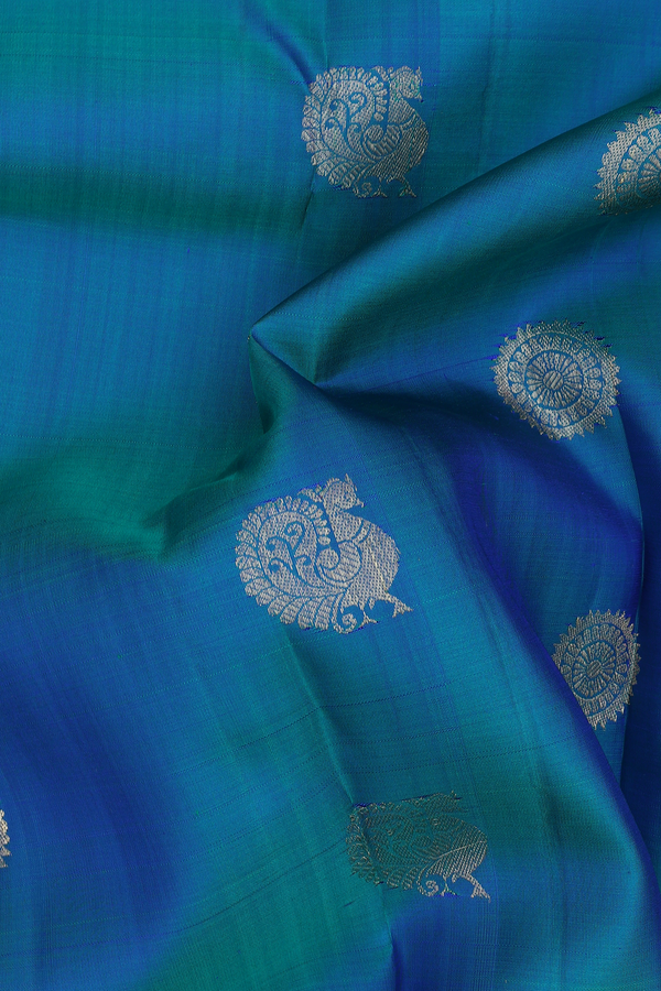 Kanchipuram Silk Saree In Peacock Blue With Peacock Buttas