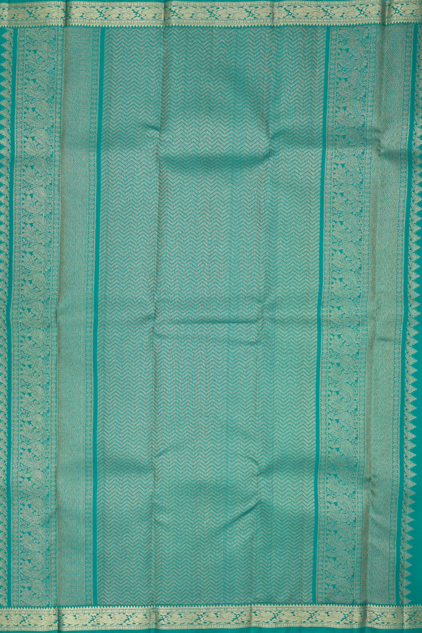 Kanchipuram Silk Saree In Green With Peacock Buttas