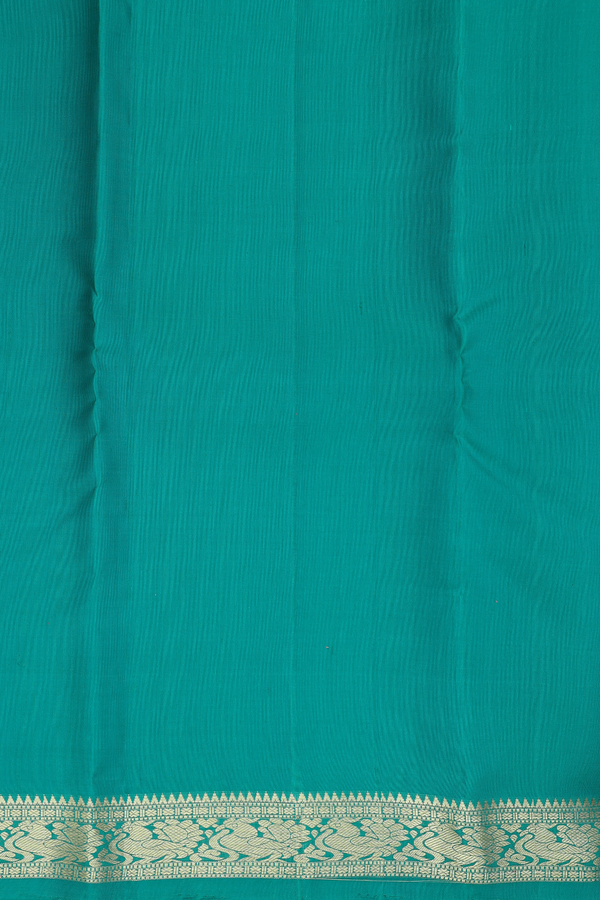 Kanchipuram Silk Saree In Green With Peacock Buttas
