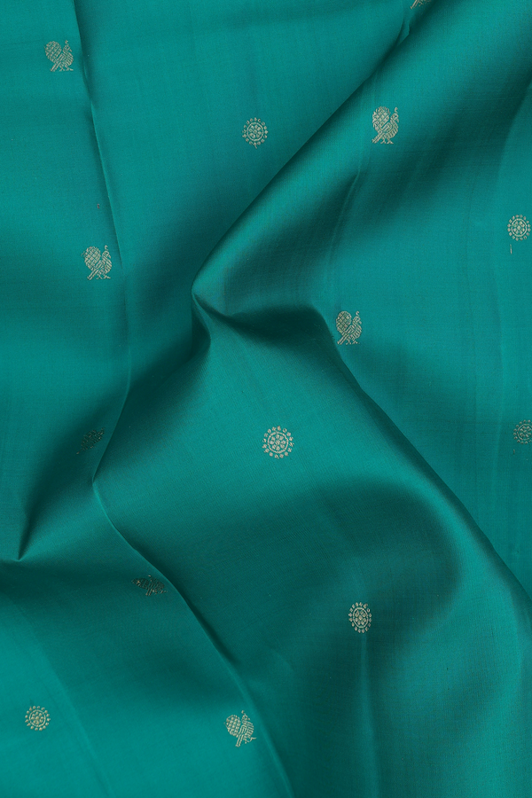 Kanchipuram Silk Saree In Green With Peacock Buttas