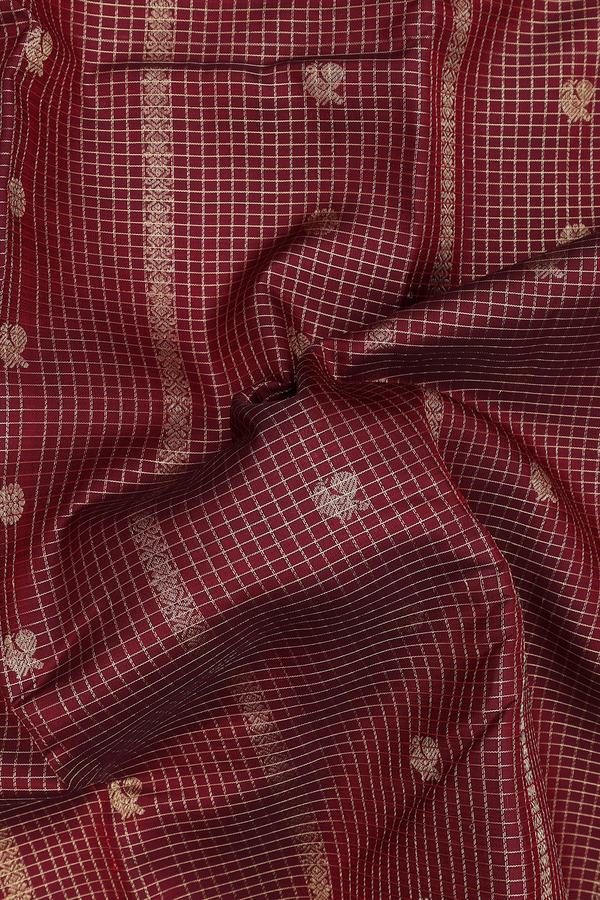 Kanchipuram Silk Saree In Maroon Along Checks With Buttas