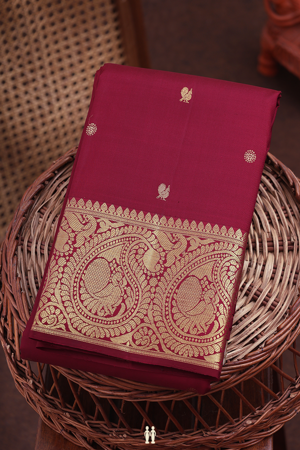 Kanchipuram Silk Saree In Maroon With Peacock Buttas