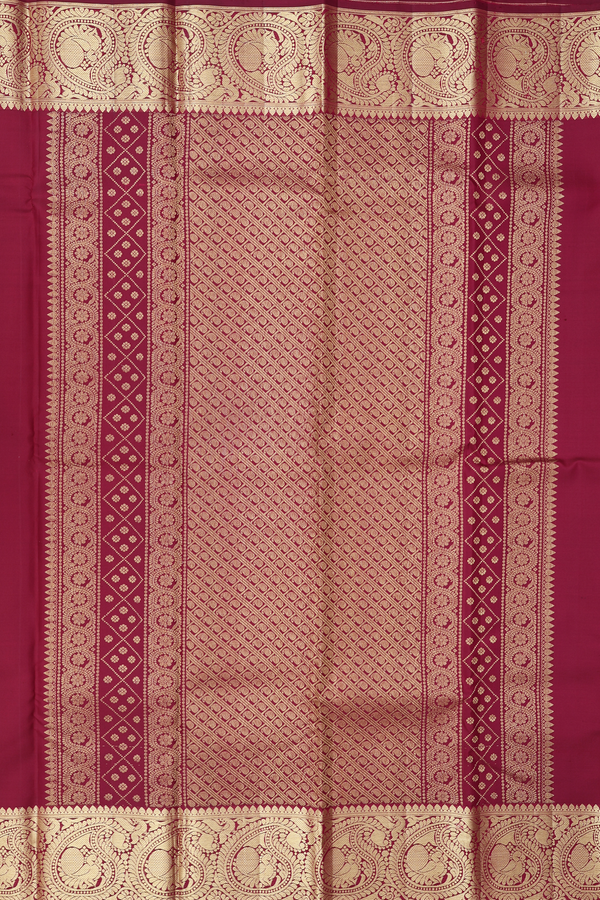 Kanchipuram Silk Saree In Maroon With Peacock Buttas