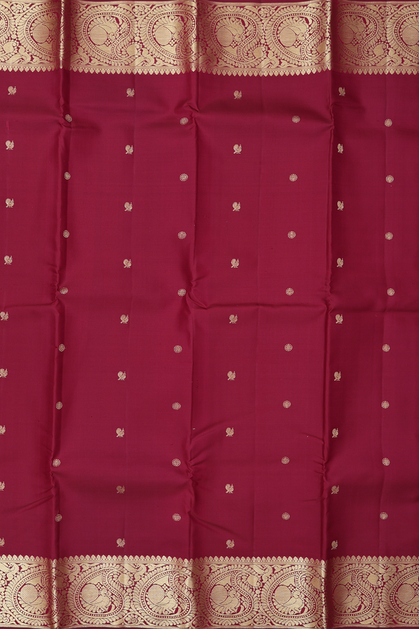 Kanchipuram Silk Saree In Maroon With Peacock Buttas