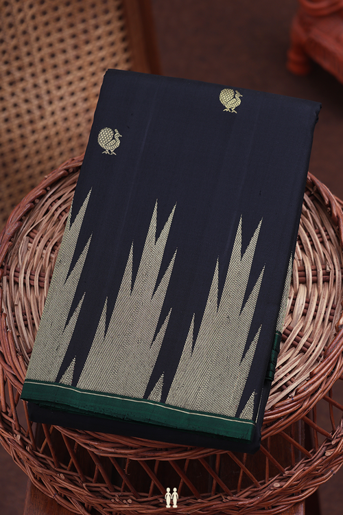 Kanchipuram Silk Saree In Black With Peacock Buttas