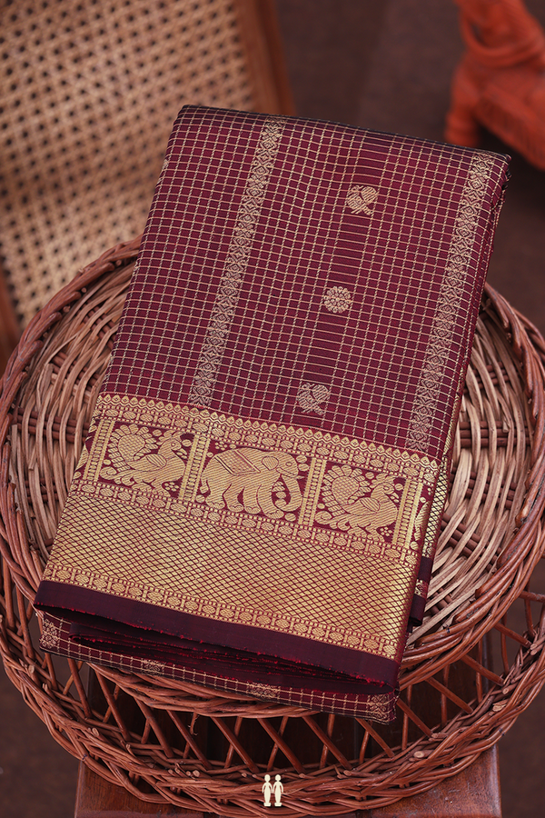 Kanchipuram Silk Saree In Maroon Along Checks With Buttas