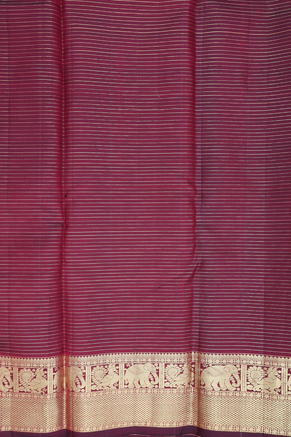 Kanchipuram Silk Saree In Maroon Along Checks With Buttas
