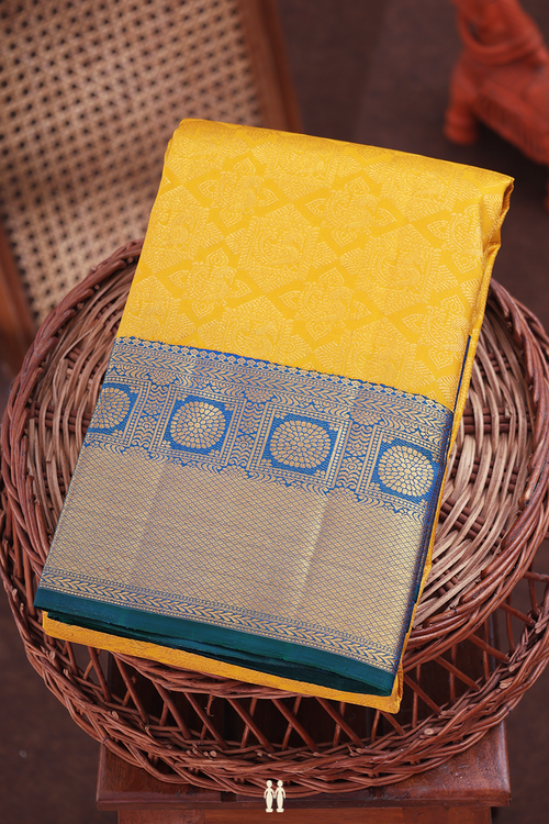 Kanchipuram Silk Saree In Saffron Yellow With Brocade Design