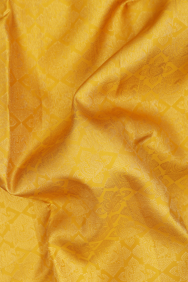 Kanchipuram Silk Saree In Saffron Yellow With Brocade Design
