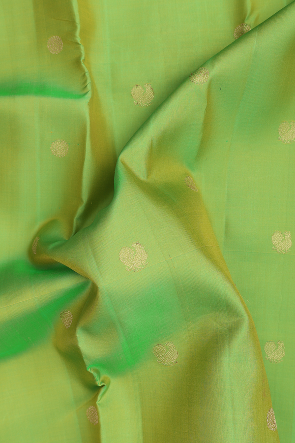 Kanchipuram Silk Saree In Lime Green With Peacock Buttas