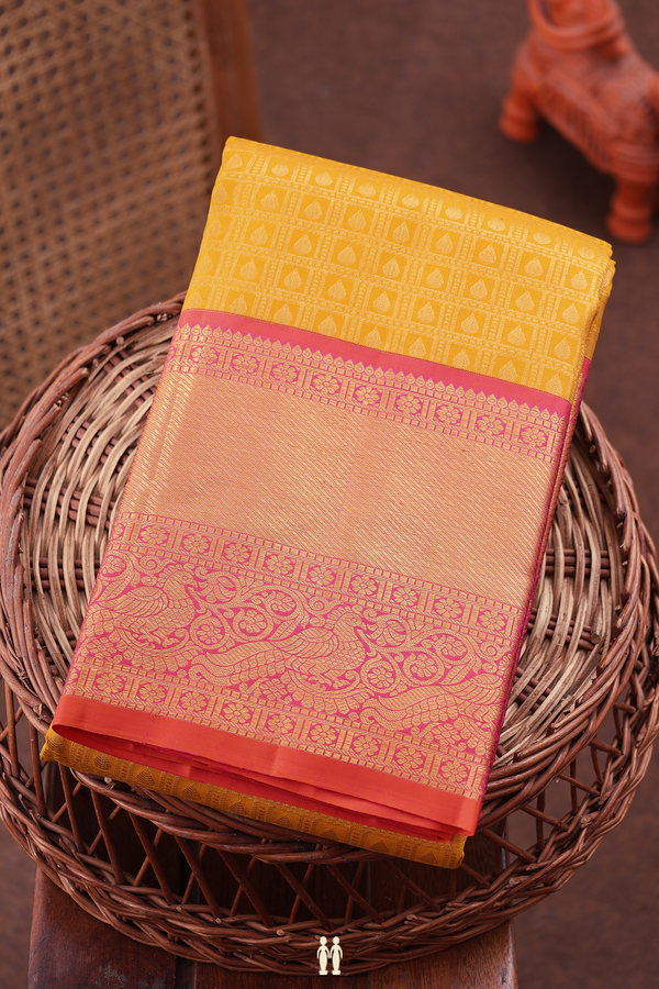 Kanchipuram Silk Saree In Saffron Yellow With Brocade Design