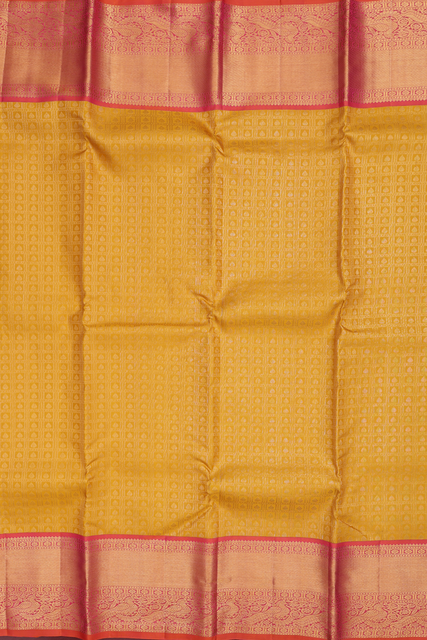 Kanchipuram Silk Saree In Saffron Yellow With Brocade Design