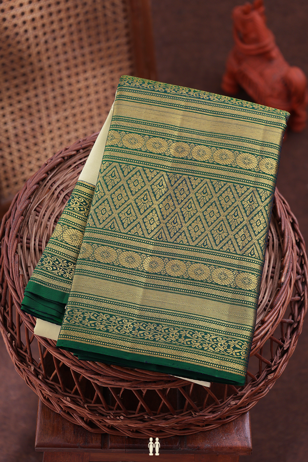 Kanchipuram Silk Saree In Off White With Peacock Buttas