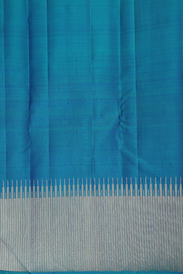 Kanchipuram Silk Saree In Teal Blue With Malli Moggu Buttas