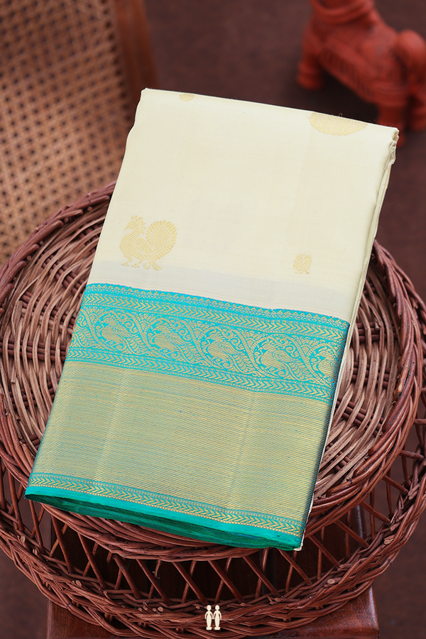 Kanchipuram Silk Saree In Off White With Peacock Buttas