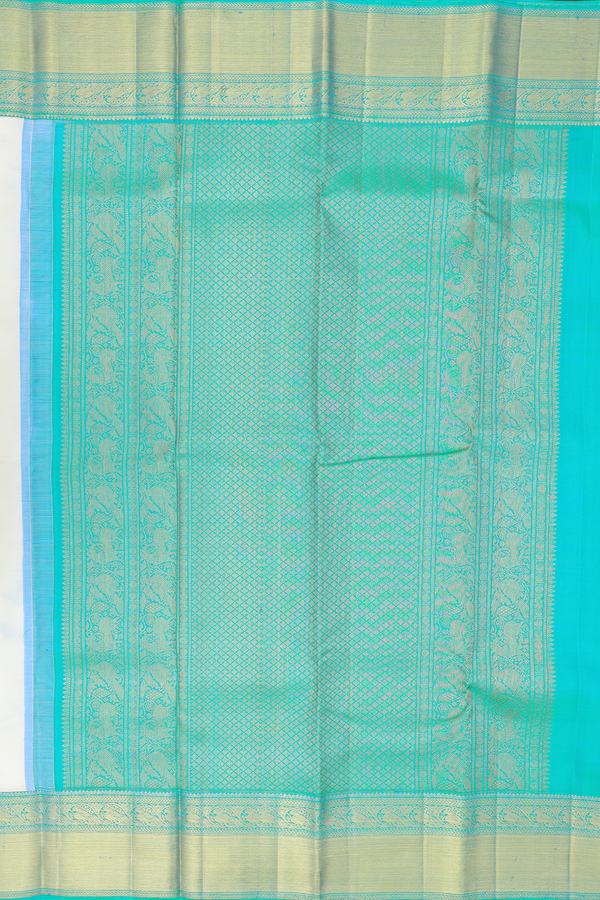 Kanchipuram Silk Saree In Off White With Peacock Buttas