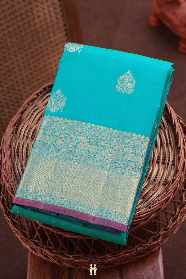 Kanchipuram Silk Saree In Bluish Green With Zari Buttas