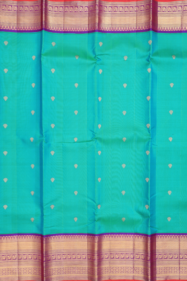 Kanchipuram Silk Saree In Bluish Green With Floral Buttas