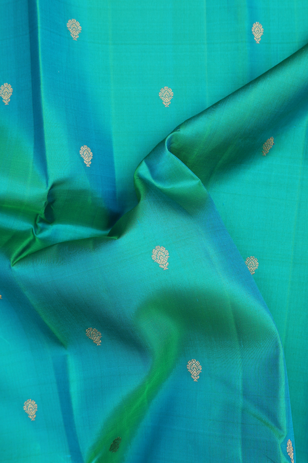 Kanchipuram Silk Saree In Bluish Green With Floral Buttas