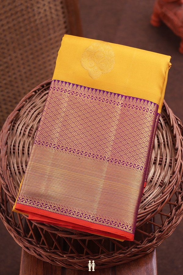 Kanchipuram Silk Saree In Saffron Yellow With Zari Motifs