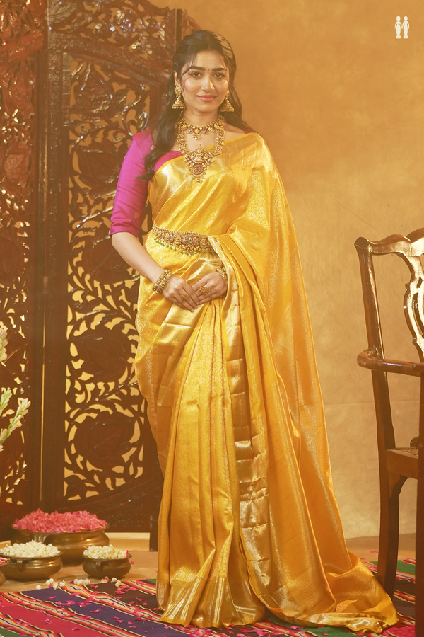 Kanchipuram Silk Saree In Saffron Yellow With Brocade Design