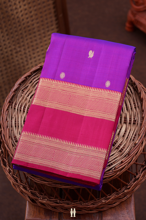 Kanchipuram Silk Saree In Purple With Peacock Buttas