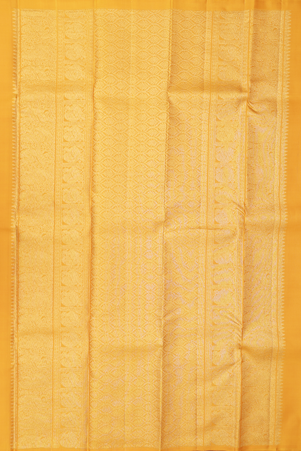 Kanchipuram Silk Saree In Saffron Yellow With Peacock Buttas