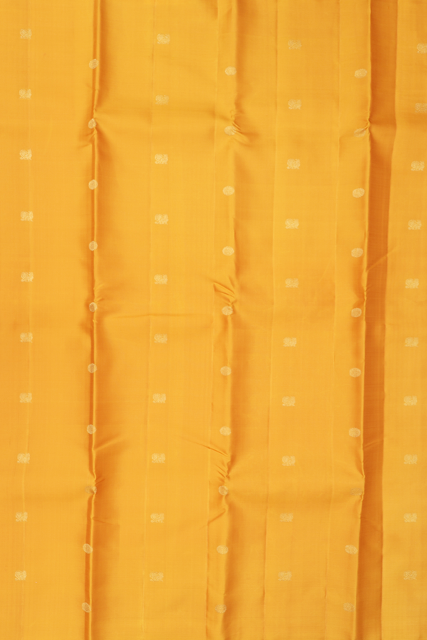 Kanchipuram Silk Saree In Saffron Yellow With Peacock Buttas