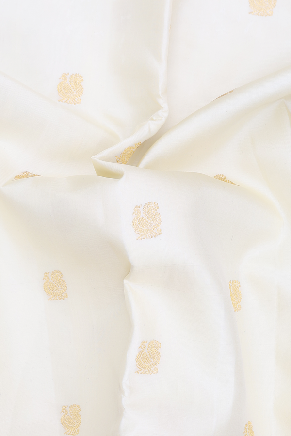 Kanchipuram Silk Saree In Off White With Peacock Buttas