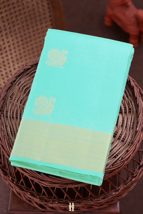 Kanchipuram Silk Saree In Tiffany Blue With Peacock Buttas