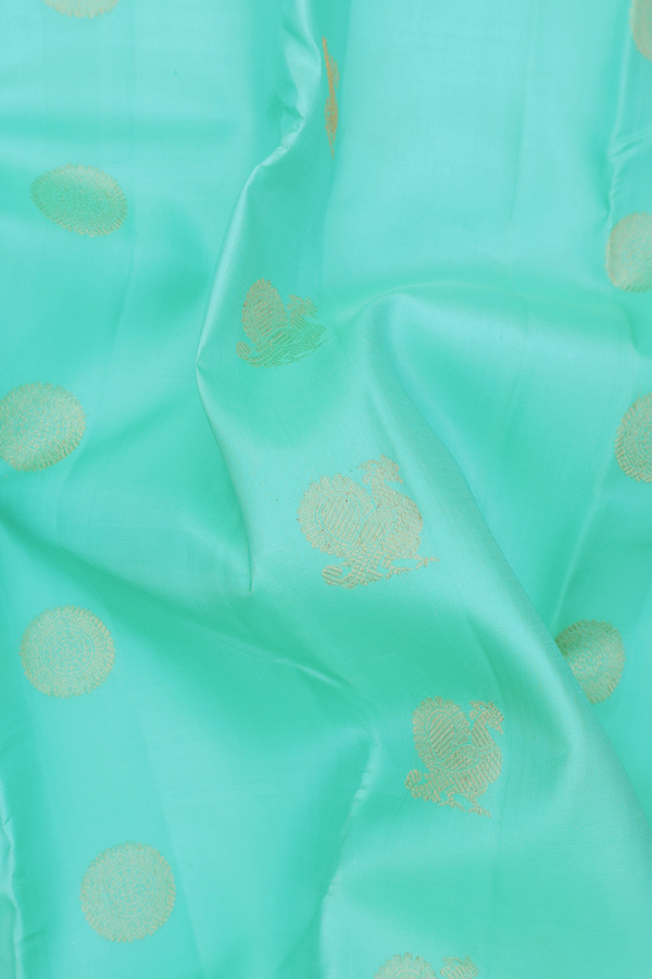 Kanchipuram Silk Saree In Tiffany Blue With Peacock Buttas