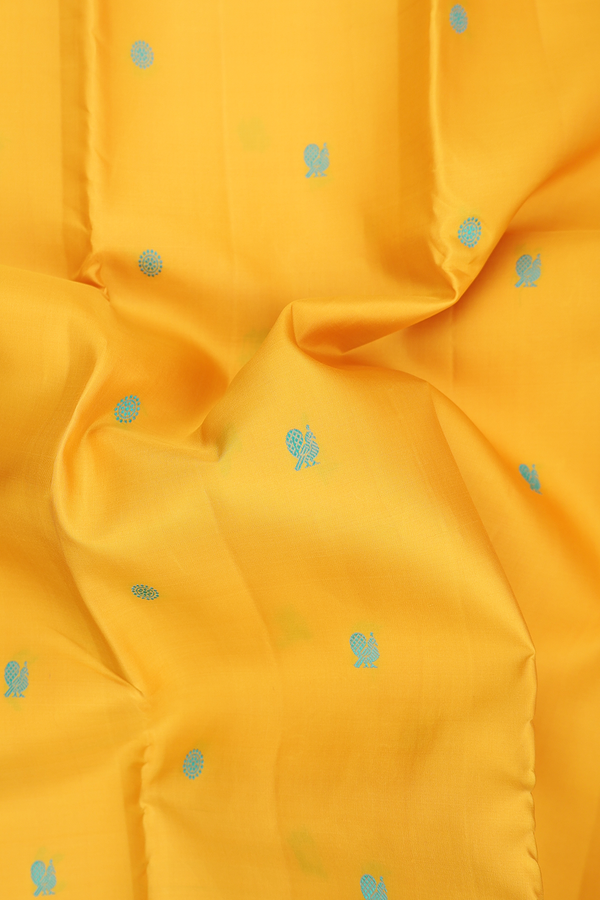 Kanchipuram Silk Saree In Saffron Yellow With Chakram Buttas