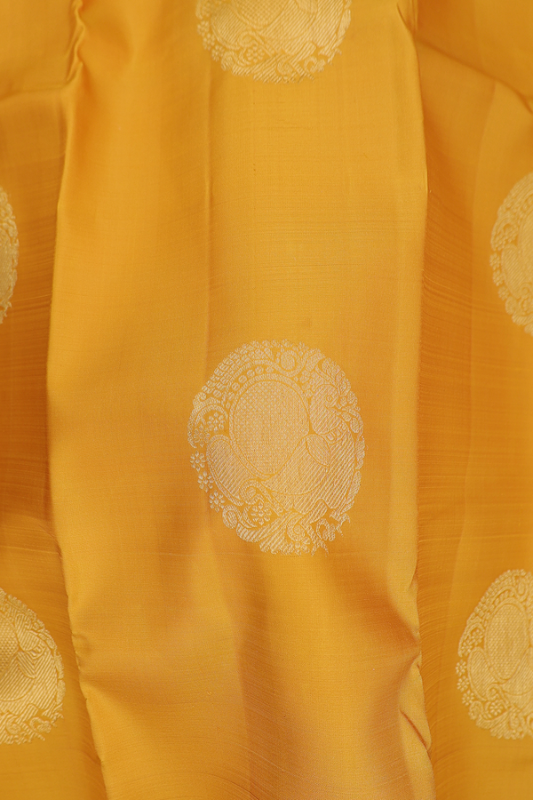 Kanchipuram Silk Saree In Saffron Yellow With Circle Motifs