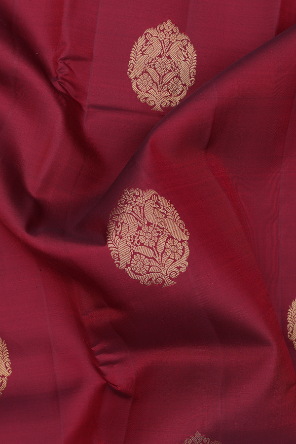 Kanchipuram Silk Saree In Maroon With Peacock Motifs