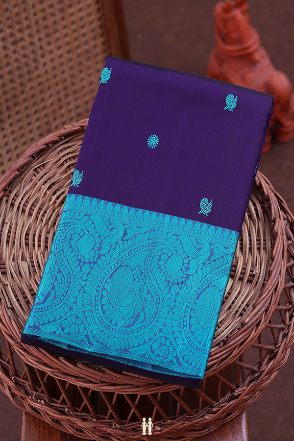 Kanchipuram Silk Saree In Navy Blue With Peacock Buttas